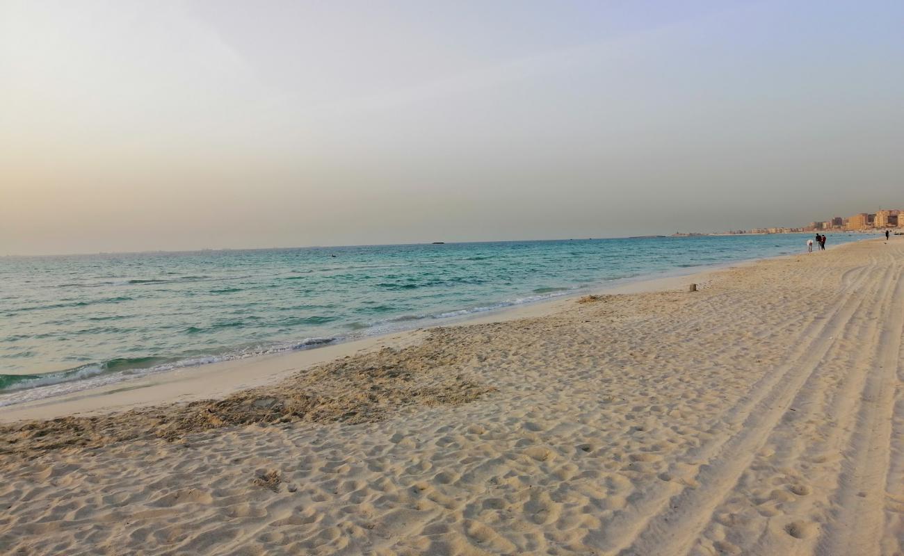 Aziz Market Beach'in fotoğrafı i̇nce beyaz kum yüzey ile