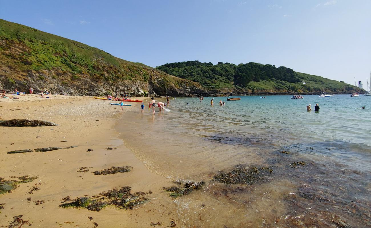 Molunan beach'in fotoğrafı parlak kum yüzey ile