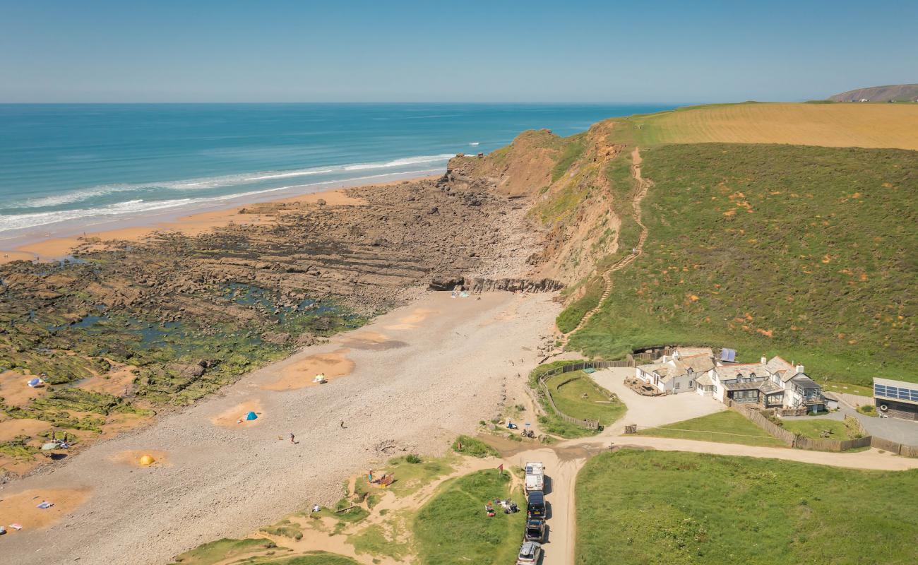 Northcott Mouth beach'in fotoğrafı gri çakıl taşı yüzey ile