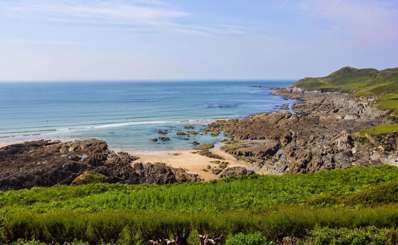 Grunta beach'in fotoğrafı parlak kum yüzey ile