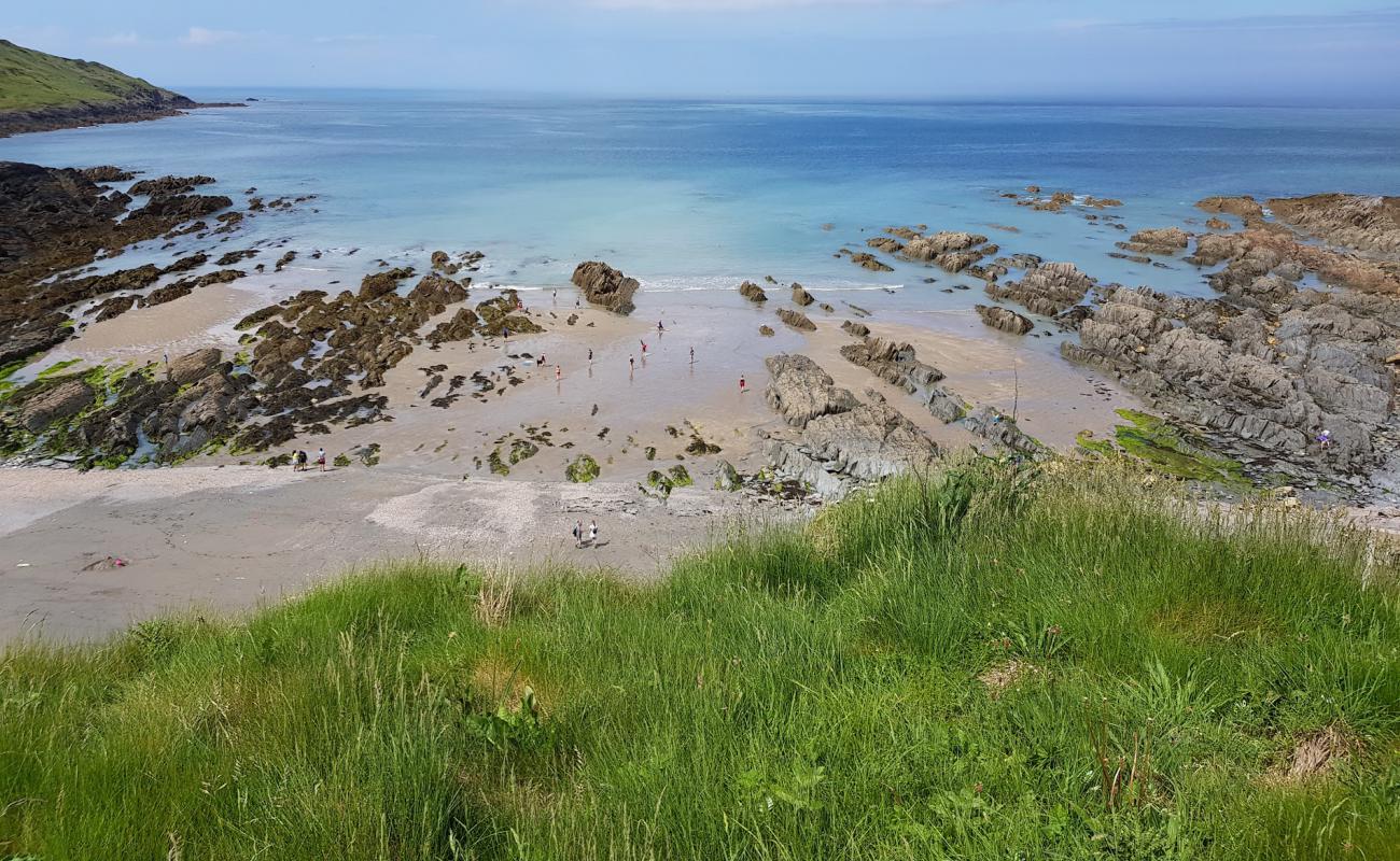 Rockham beach'in fotoğrafı bej kum ve kayalar yüzey ile
