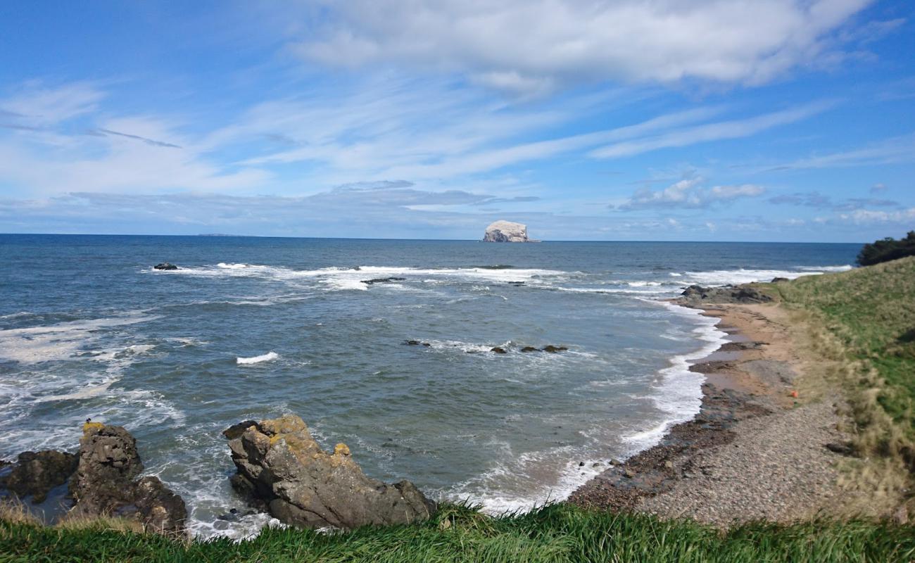 Haugh Road Beach'in fotoğrafı bej kum ve kayalar yüzey ile