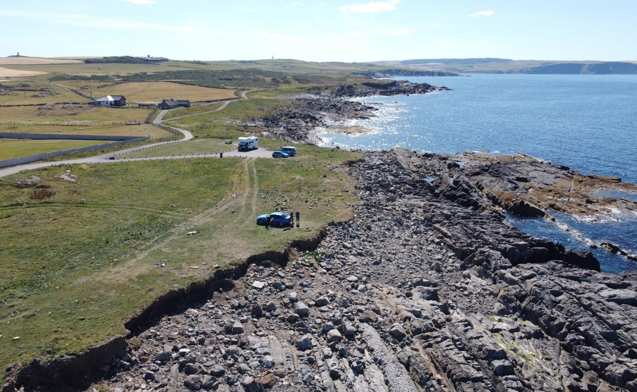 Stony Beach, Rosehearty'in fotoğrafı taşlar yüzey ile