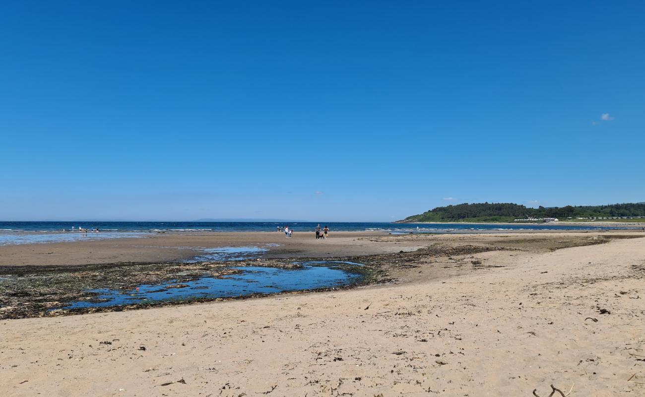 Maidens Beach'in fotoğrafı açık bej kum yüzey ile