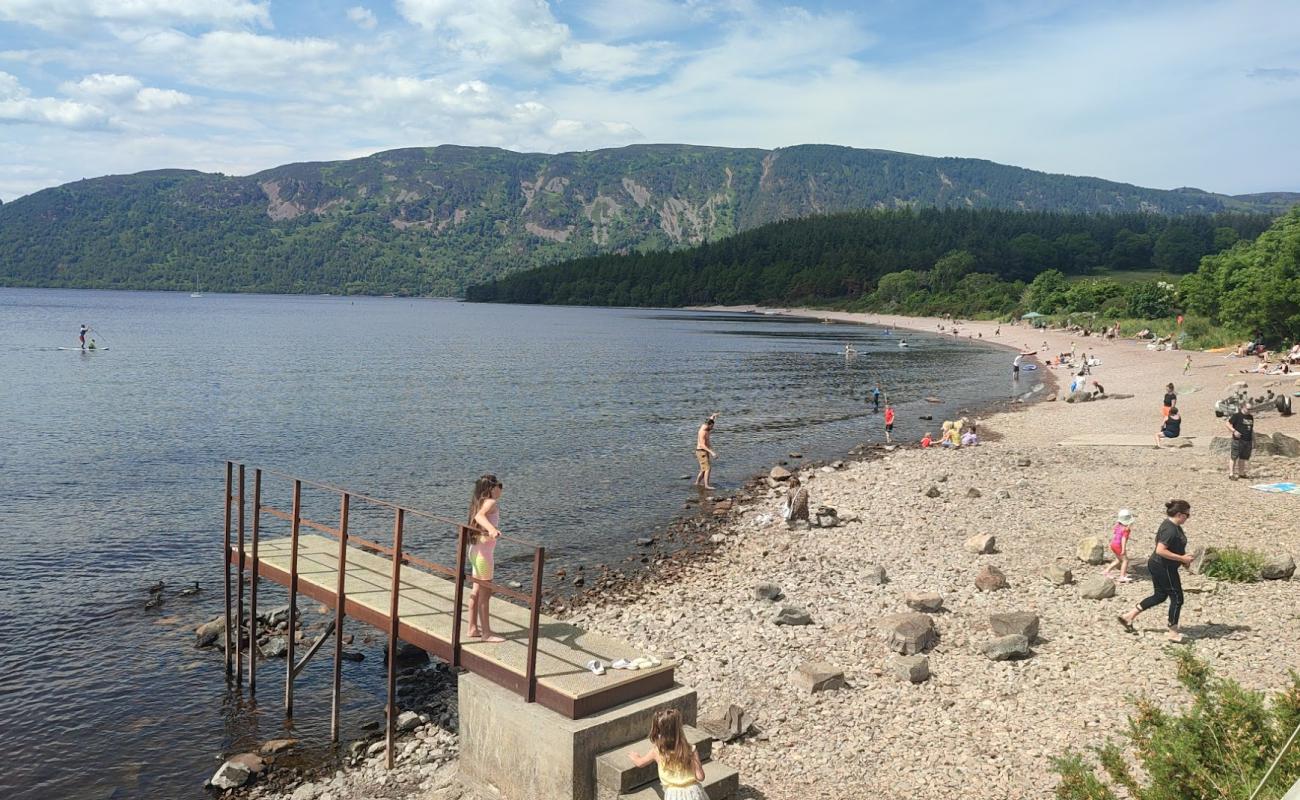 Dores Plajı'in fotoğrafı gri çakıl taşı yüzey ile