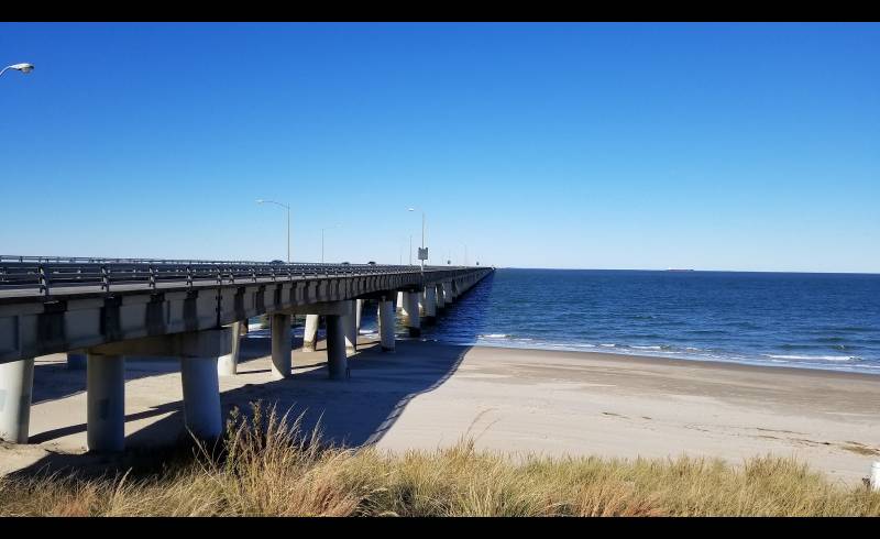 Chesapeake beach'in fotoğrafı açık bej kum yüzey ile