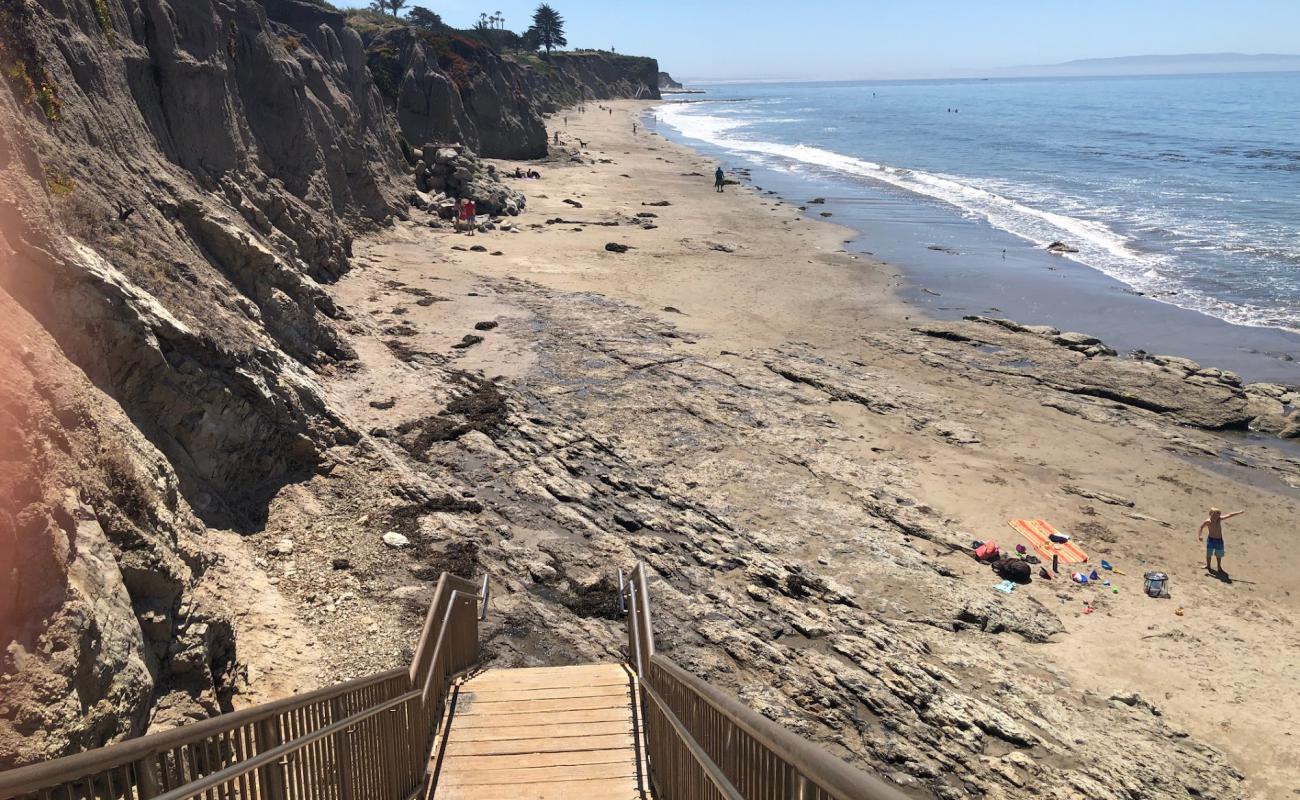 South Palisades beach'in fotoğrafı parlak kum ve kayalar yüzey ile