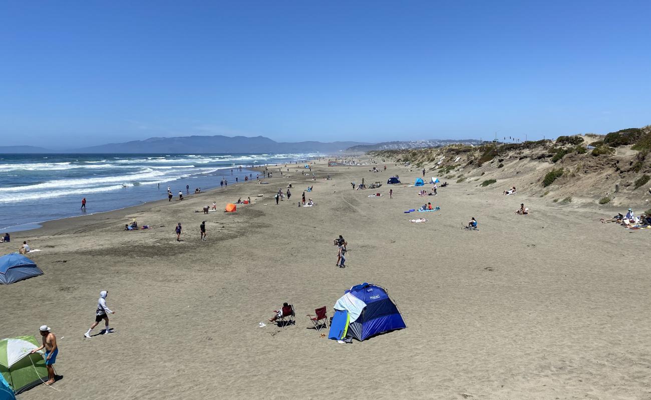 Ocean Beach'in fotoğrafı parlak kum yüzey ile