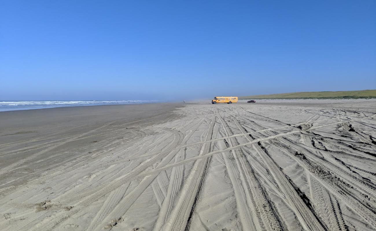 Sunset Beach'in fotoğrafı parlak ince kum yüzey ile