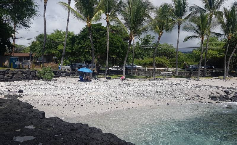 Pahoehoe Beach'in fotoğrafı parlak kum ve kayalar yüzey ile