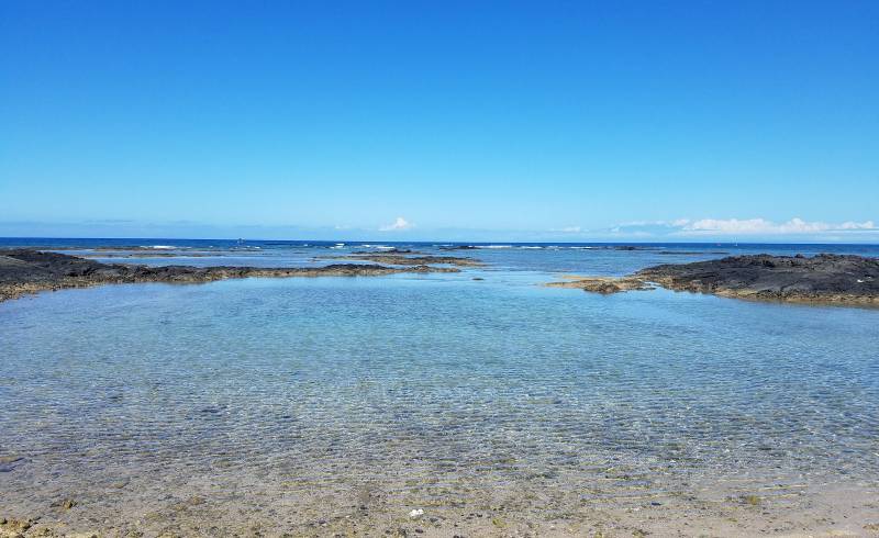 Mauna Lani Beach'in fotoğrafı parlak kum yüzey ile