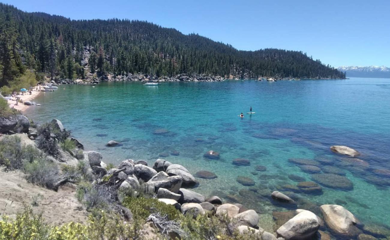 Creek Beach'in fotoğrafı açık bej kum yüzey ile