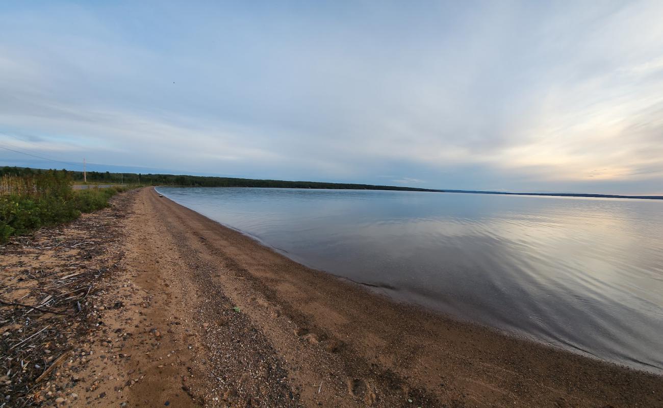 First Sand Beach'in fotoğrafı bej kum ve çakıl yüzey ile