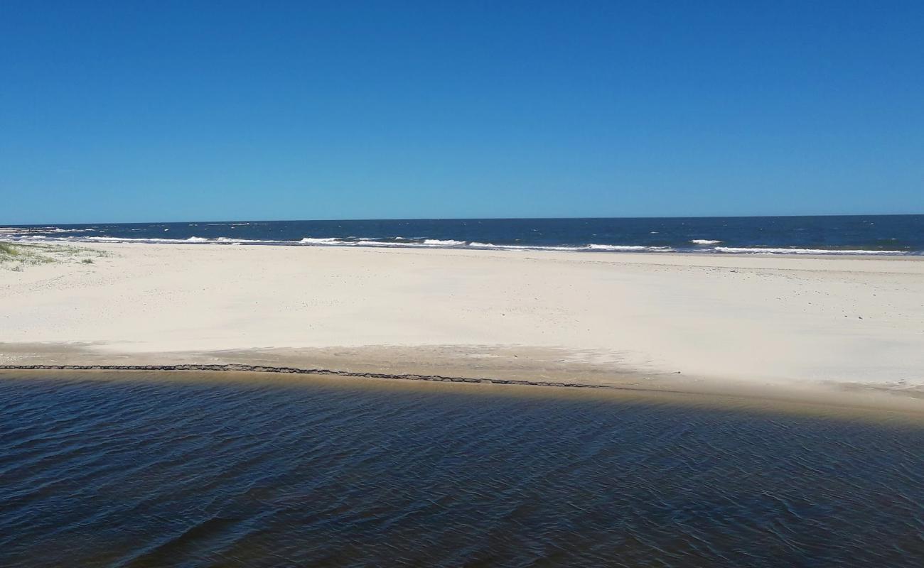 San Antonio Beach'in fotoğrafı açık bej kum yüzey ile