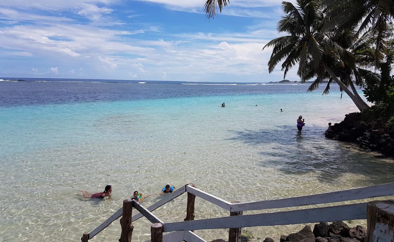 Tanu Beach'in fotoğrafı açık bej kum yüzey ile