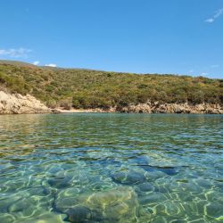 Marathi III beach'in fotoğrafı doğal alan içinde bulunmaktadır