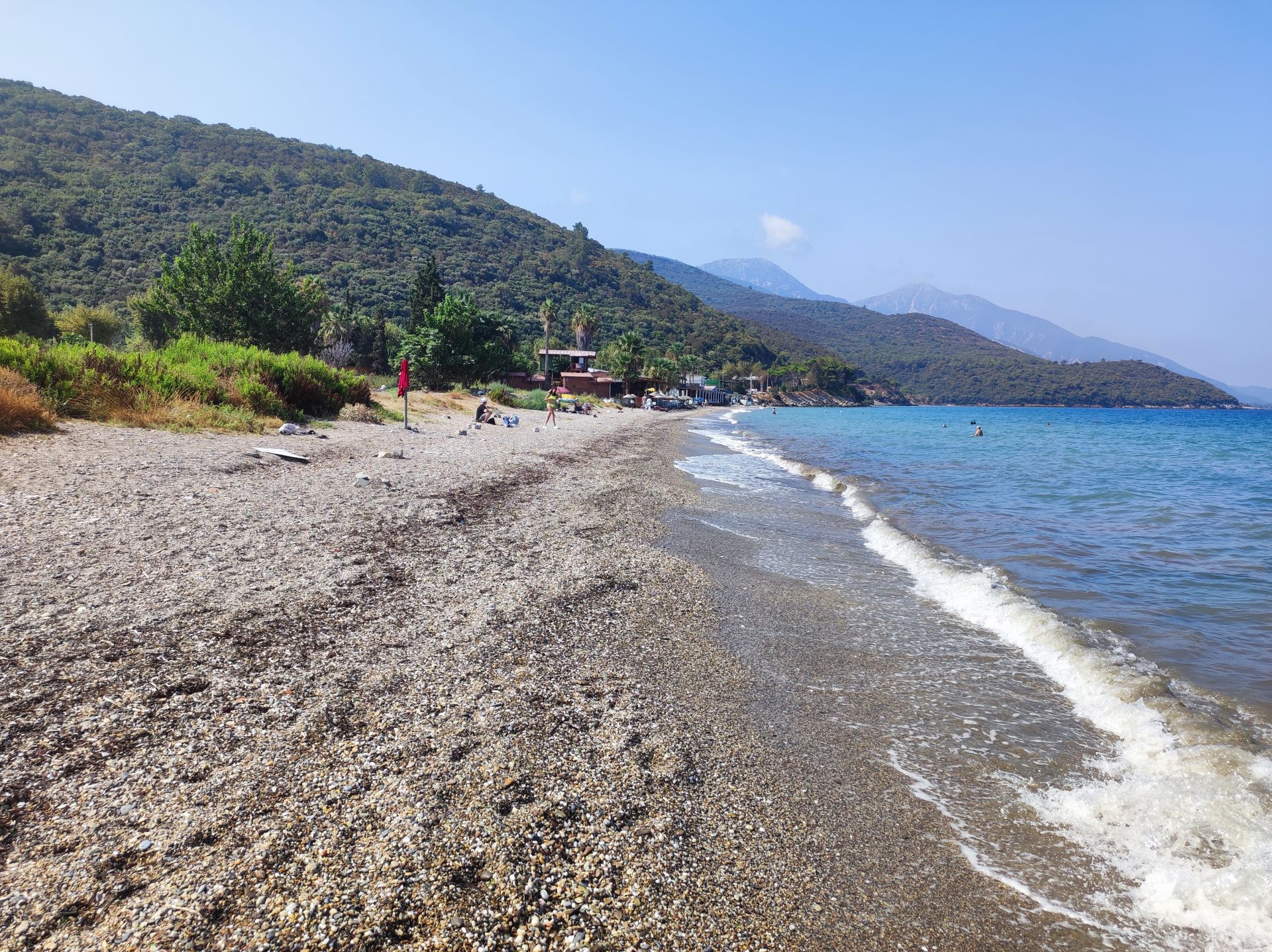 Guzelcamli beach'in fotoğrafı - rahatlamayı sevenler arasında popüler bir yer