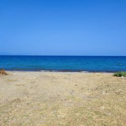 Guzelcamli beach'in fotoğrafı turkuaz saf su yüzey ile