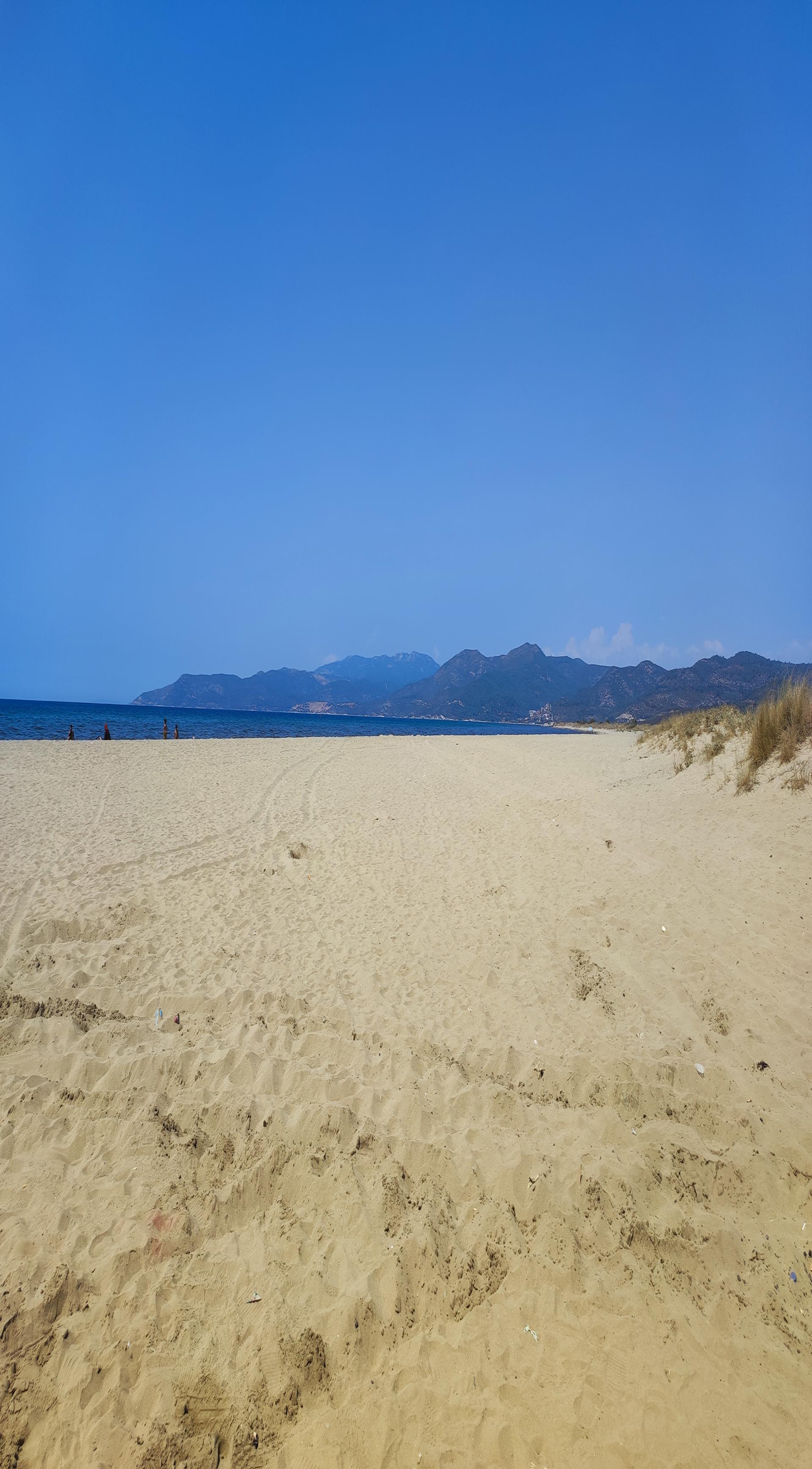 Pamucak beach'in fotoğrafı ve yerleşim
