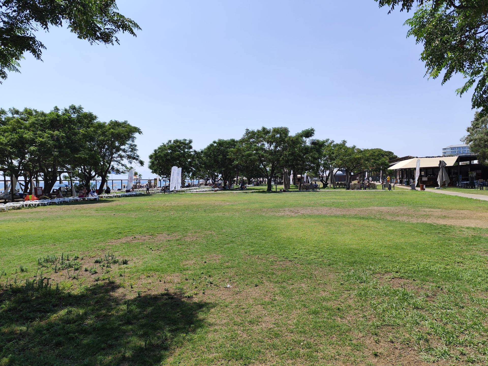 Belek Halk Plajı'in fotoğrafı - rahatlamayı sevenler arasında popüler bir yer