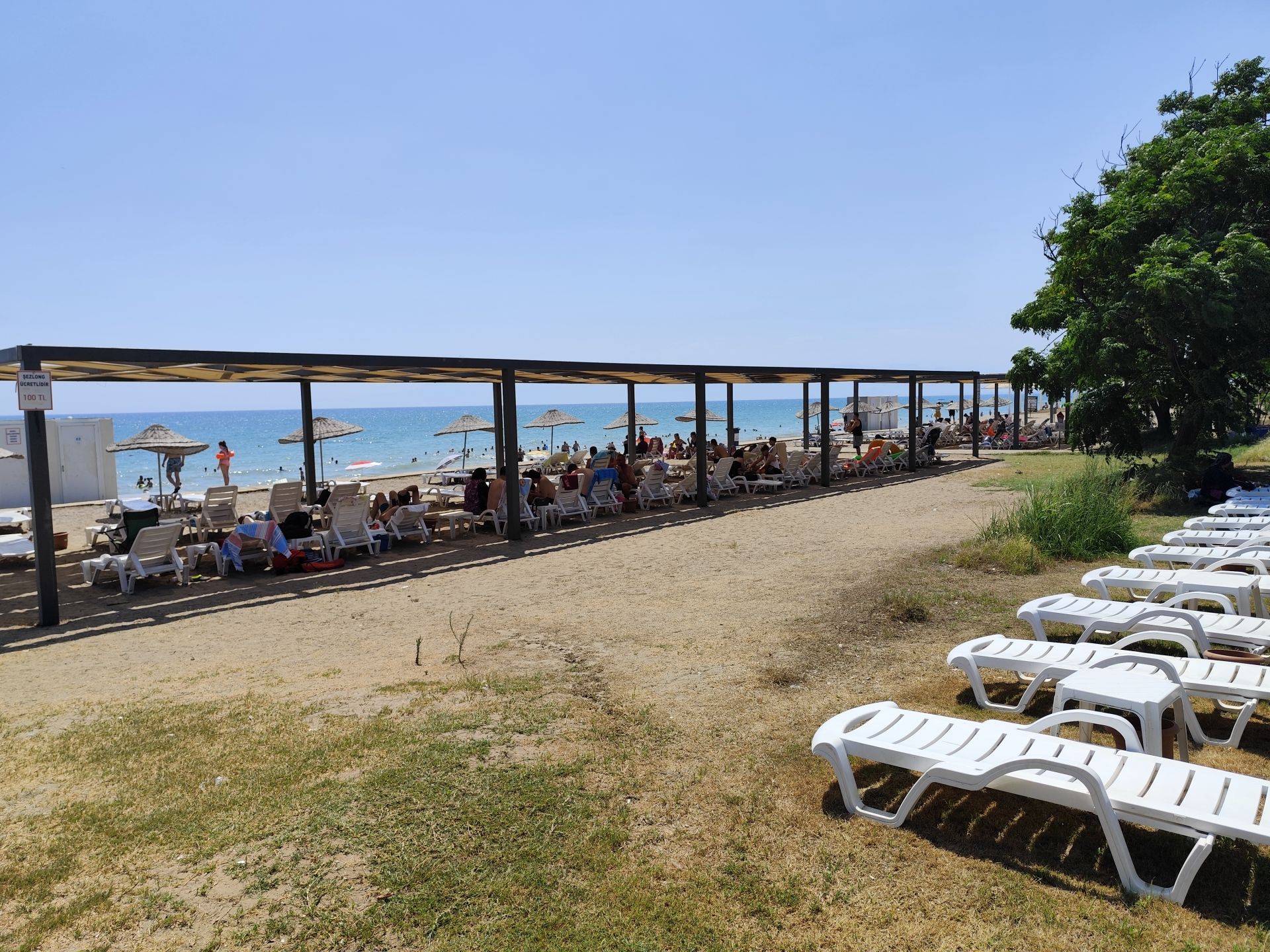 Belek Halk Plajı'in fotoğrafı kahverengi kum yüzey ile